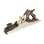 A 15 1/2" d/t steel panel plane by BUCK 242 Tottenham Ct Rd with rosewood infill and handle,