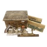 A STANLEY No 45 combination plane with two boxes of cutters in craftsman made pine box G