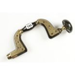 A metallic framed patent ebony brace by ALFRED RIDGE with ivory ring in ebony head G+