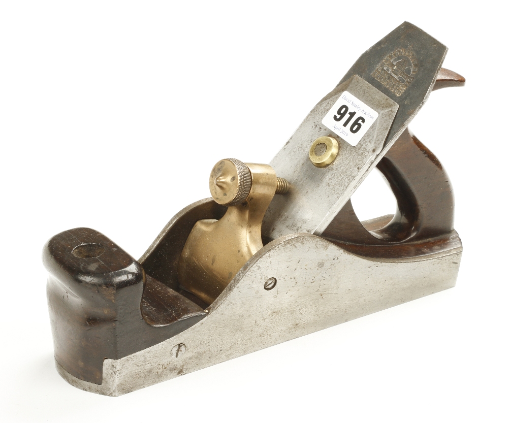 A most unusual heavy iron rebate plane 10" x 2 1/2" with sloping sides and rosewood infill and