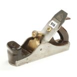 A most unusual heavy iron rebate plane 10" x 2 1/2" with sloping sides and rosewood infill and