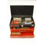A tool box with a few engineers tools G