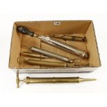 Six brass pumps:- veterinary, football,