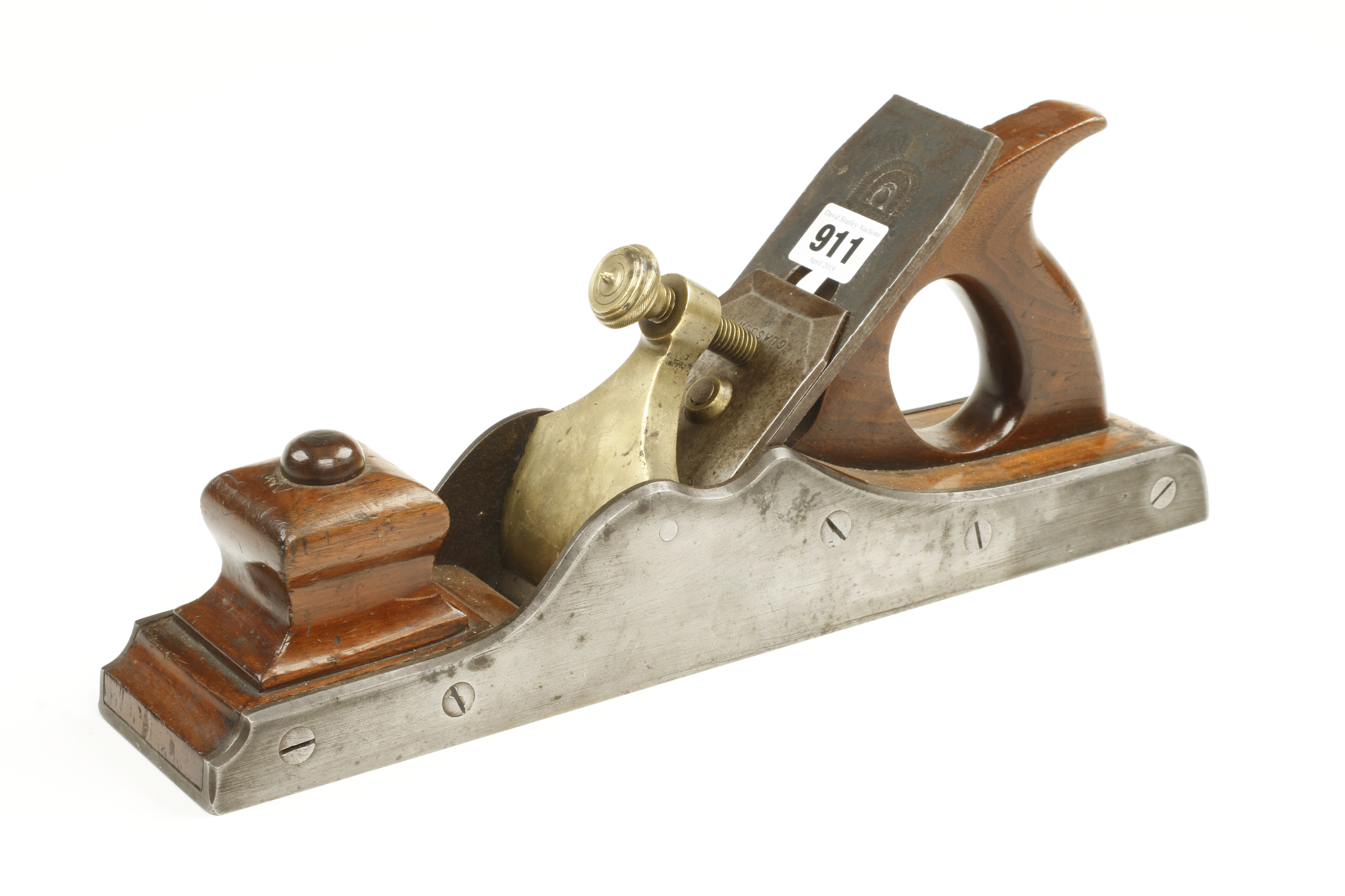 A fine quality 14 1/2" Scottish iron panel plane with mahogany infill and handle,