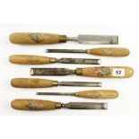 A set of seven bevel edge chisels by TYZACK with ash handles G