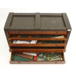 A five drawer tool chest lacks front panel with a few tools G-