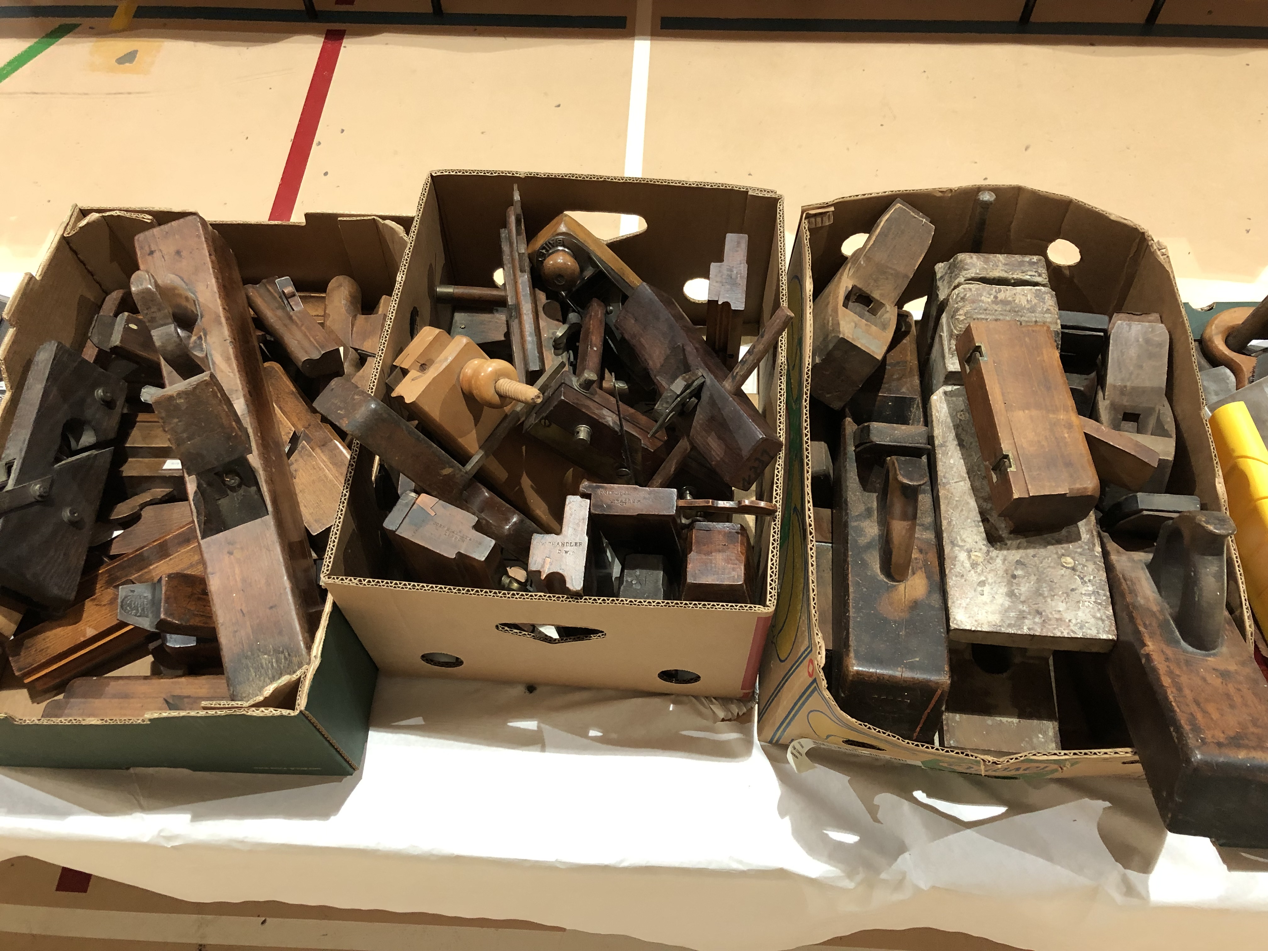 Three boxes of wood planes G