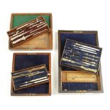 Three set of brass and German silver drawing sets in rosewood boxes,