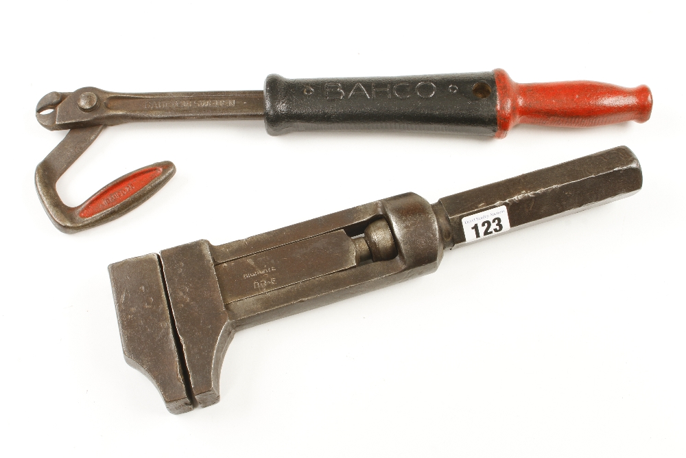 A heavy 14" wrench marked HIGHGATE BR-E and a nailpull G+