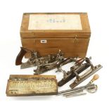 A STANLEY No 55 combination plane with set of cutters in craftsman made box G+