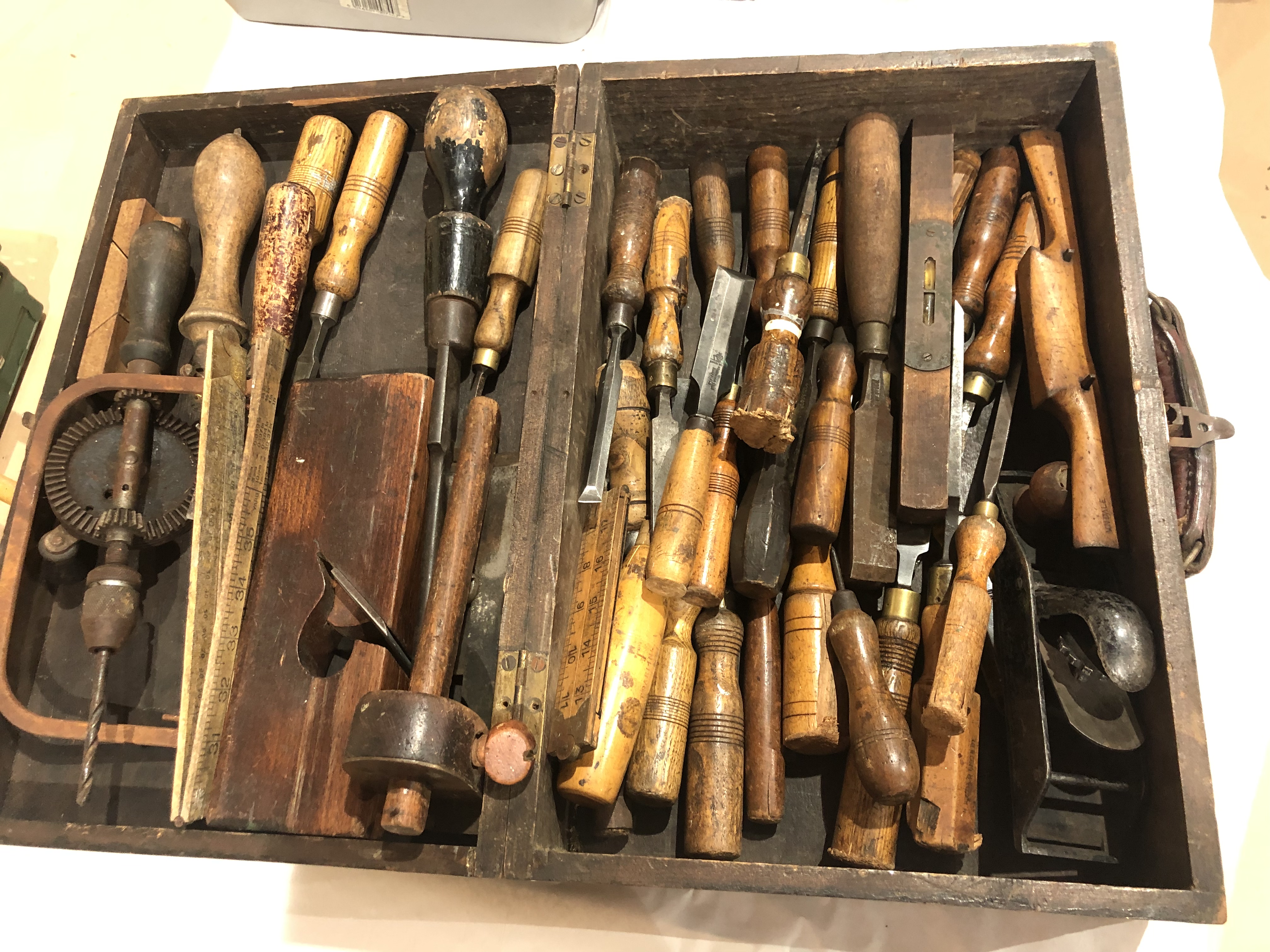 A quantity of chisels and tools in small wood carrying box G