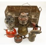 Two Tilley lamps, two oilstones,