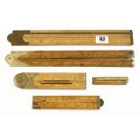 Two 24" boxwood slide rules and three four folds G