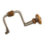 An unusual 18c button pad iron brace with deep sweep handle with chunky ash grip and boxwood head,