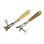 Two ham bone grips with horn handles G+