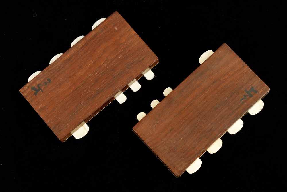 A fine pair of ivory card counters on polished mahogany bases with intricate floral and insect - Image 3 of 3