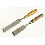 A 1 1/2" paring chisel by IBBOTSON with boxwood handle and 1 3/4" firmer chisel by WARD G+