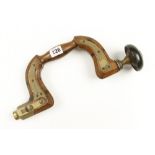 A brass plated lever pad beech brace by HOWARTH,