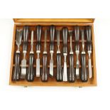 A set of 12 recent carving tools in fitted box N