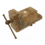 A wooden vice G