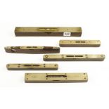 Six brass topped ebony or rosewood levels 7" to 12" G+