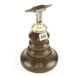 A jewellers small anvil on turned wood stand G