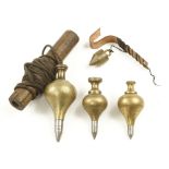 Four brass plumb bobs G