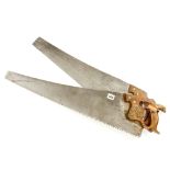 A DISSTON D8 rip saw with finger hole handle and another D8 handsaw G+