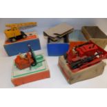 Dinky:- 571 Coles crane, 14C fork lift and 561 Dozer, each boxed.