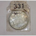 Wreck coin:- Spain Pillar dollar 1734 with original 1970's lot number attached.