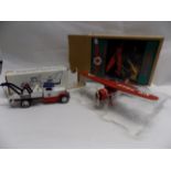 ERTL:- 1931 International Wrecker boxed, together with ERTL 1929 Lockheed Air Express, each boxed.