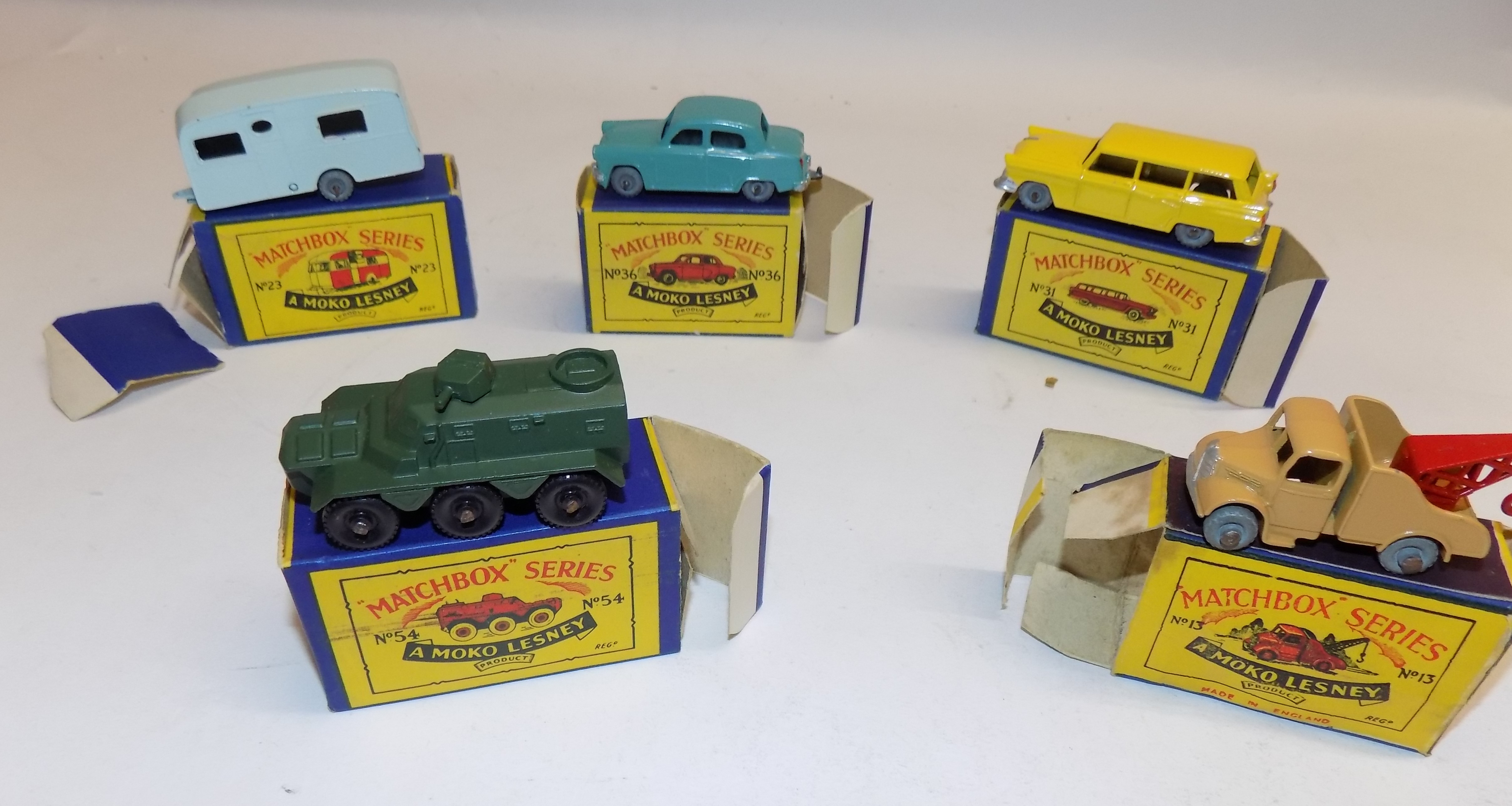 Matchbox :- 23 caravan, 36 Austin A50, 31 Ford Station Wagon, 54 Saracen carrier,