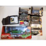 Corgi:- James Bond :- seven boxed models together with an ERTL Jaguar and James box mug.