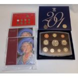 GB:- Queen Mother Centenary crown in card case (2) together with a 2001 proof coin set,