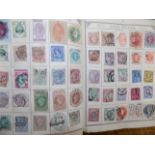 A well filled blue Lincoln stamp album with G,.