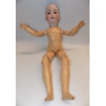A William Goeber doll, the porcelain head with sleep eyes, open mouth and teeth,