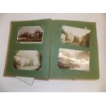 An Edwardian album containing approximately 180 postcards, topo and subject including Cornish,