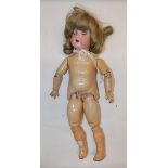 An Armand Marseille doll,
