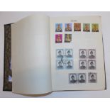 A small album containing Malaysian stamps.