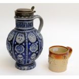 A German Westerwald stoneware jug, with white metal mounted hinged cover,