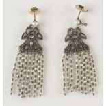 A pair of pearl and diamond set earrings,