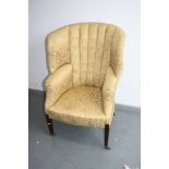 A 19th century mahogany upholstered wing armchair,