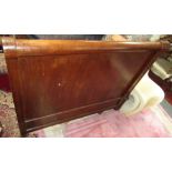 A continental mahogany bed, 19th century, each headboard with a single brass mounted column,