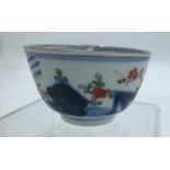 An early 20th century Japanese 'Kakiemon' pattern tea bowl, diameter 7cm, 4 character mark.