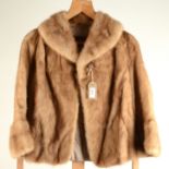 A short mink ladies' jacket by Annis Furs, three-quarter length fluted sleeves, light brown,