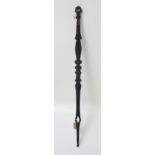 A Polynesian ceremonial tribal carved wood staff, 19th century, possibly from the Marquesas Islands,