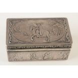 A Dutch silver embossed trinket box, the lid showing a horseman in a landscape,