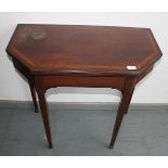 A 19th century mahogany fold over card table,