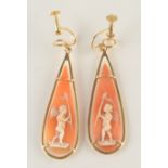 A pair of gold mounted, pear form, carved shell, cameo earrings.