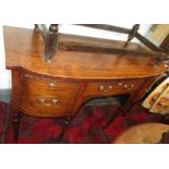 A George III mahogany bow front sideboard with three drawers on ring turned legs, height 90 cm,